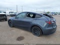 2022 Tesla Model Y — photo 3 of 15 | VIN 7SAYGDEE0NF390409