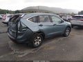 2014 Honda CR-V — photo 4 of 16 | VIN 2HKRM4H31EH601428