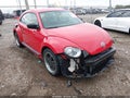 2014 Volkswagen Beetle — photo 1 of 18 | VIN 3VWF17AT7EM641012