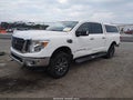 2017 Nissan Titan — photo 2 of 15 | VIN 1N6BA1F4XHN511037