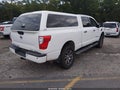 2017 Nissan Titan — photo 4 of 15 | VIN 1N6BA1F4XHN511037