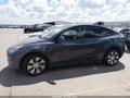 2022 Tesla Model Y — photo 13 of 18 | VIN 7SAYGDEE1NA004870