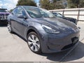 2022 Tesla Model Y — photo 1 of 18 | VIN 7SAYGDEE1NA004870