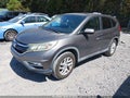 2015 Honda CR-V — photo 2 of 16 | VIN 5J6RM4H53FL018352