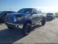 2011 Toyota Tundra — photo 2 of 16 | VIN 5TFFY5F15BX102257