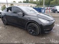 2021 Tesla Model Y — photo 1 of 20 | VIN 5YJYGDED6MF107109