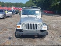 2002 Jeep Wrangler — photo 12 of 16 | VIN 1J4FA39S72P742994