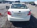 2010 Kia Rio — photo 16 of 16 | VIN KNADH4A37A6656699