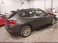 2015 BMW X1 — photo 4 of 15 | VIN WBAVL1C57FVY35497