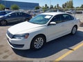 2014 Volkswagen Passat — photo 2 of 16 | VIN 1VWAT7A38EC027138