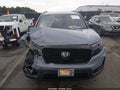 2024 Honda Passport — photo 12 of 16 | VIN 5FNYF8H84RB008420