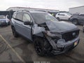 2024 Honda Passport — photo 1 of 16 | VIN 5FNYF8H84RB008420