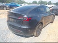 2024 Tesla Model Y — photo 4 of 15 | VIN 7SAYGDED3RA324933