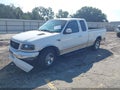 2000 Ford F-150 — photo 2 of 16 | VIN 1FTRX17W3YNC38216