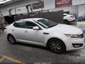 2013 Kia Optima — photo 13 of 16 | VIN 5XXGM4A77DG257585