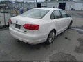 2012 Volkswagen Jetta — photo 4 of 12 | VIN 3VWLX7AJXCM304542