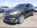 2014 Chevrolet Traverse — photo 2 of 16 | VIN 1GNKVJKD3EJ334855