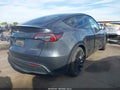2023 Tesla Model Y — photo 4 of 18 | VIN 7SAYGDEF0PF864838