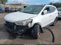2014 Hyundai Santa Fe — photo 2 of 16 | VIN 5XYZWDLA0EG141296