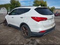 2014 Hyundai Santa Fe — photo 3 of 16 | VIN 5XYZWDLA0EG141296