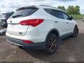 2014 Hyundai Santa Fe — photo 4 of 16 | VIN 5XYZWDLA0EG141296