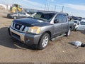 2014 Nissan Titan — photo 2 of 16 | VIN 1N6BA0ED9EN509111
