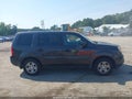 2013 Honda Pilot — photo 13 of 16 | VIN 5FNYF4H21DB042862