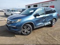 2016 Honda Pilot — photo 2 of 20 | VIN 5FNYF5H31GB020301