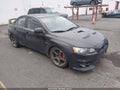 2013 Mitsubishi Lancer Evolution — photo 1 of 16 | VIN JA32W5FV9DU005024