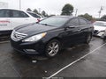2013 Hyundai Sonata — photo 2 of 13 | VIN 5NPEC4AC2DH706165