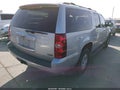 2011 Chevrolet Suburban 1500 — photo 4 of 17 | VIN 1GNSCJE09BR161225