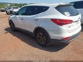 2014 Hyundai Santa Fe — photo 3 of 16 | VIN 5XYZU3LB8EG125825