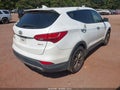 2014 Hyundai Santa Fe — photo 4 of 16 | VIN 5XYZU3LB8EG125825