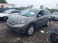 2013 Honda CR-V — photo 2 of 16 | VIN 5J6RM4H77DL011726