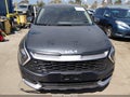 2023 Kia Sportage Hybrid — photo 12 of 16 | VIN KNDPUCAG2P7057673