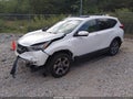 2018 Honda CR-V — photo 2 of 16 | VIN 2HKRW1H88JH518707