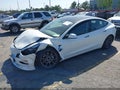 2023 Tesla Model 3 — photo 2 of 19 | VIN 5YJ3E1EA6PF639856