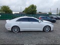 2015 Lincoln MKZ — photo 13 of 16 | VIN 3LN6L2JK5FR616701