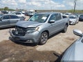 2018 Honda Ridgeline — photo 2 of 16 | VIN 5FPYK3F79JB009633