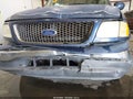 2002 Ford F-150 — photo 6 of 15 | VIN 1FTRW07LX2KC22669