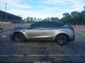 2026 Tesla Model Y — photo 13 of 15 | VIN 7SAYGDED6TA610167