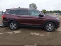 2016 Honda Pilot — photo 14 of 19 | VIN 5FNYF6H51GB061373