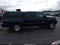 2010 Toyota Tacoma — photo 13 of 16 | VIN 3TMLU4EN8AM054593