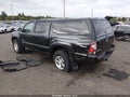 2010 Toyota Tacoma — photo 3 of 16 | VIN 3TMLU4EN8AM054593