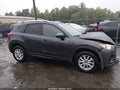 2016 Mazda CX-5 — photo 13 of 16 | VIN JM3KE4CY5G0714405