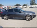 2019 Kia Optima — photo 13 of 18 | VIN 5XXGT4L39KG285544