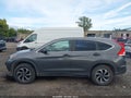2014 Honda CR-V — photo 14 of 16 | VIN 2HKRM4H37EH617245