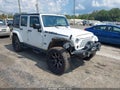 2014 Jeep Wrangler Unlimited — photo 1 of 16 | VIN 1C4BJWEG9EL200475