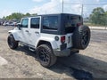 2014 Jeep Wrangler Unlimited — photo 3 of 16 | VIN 1C4BJWEG9EL200475