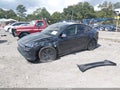 2026 Tesla Model Y — photo 2 of 18 | VIN 7SAYGDEE1TF520887